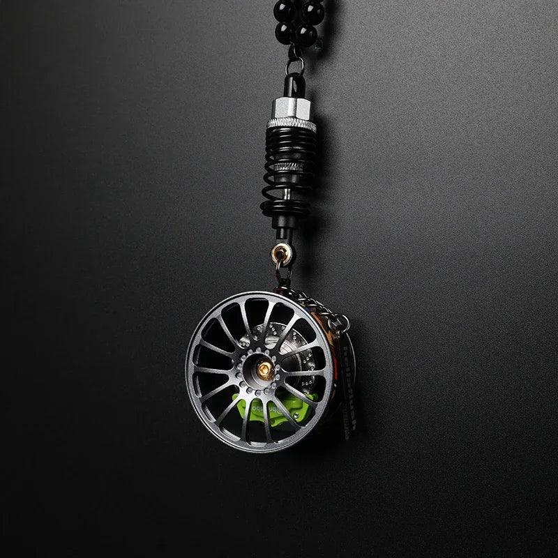 Pendentif décoratif de voiture design amortisseur et moyeu de roue