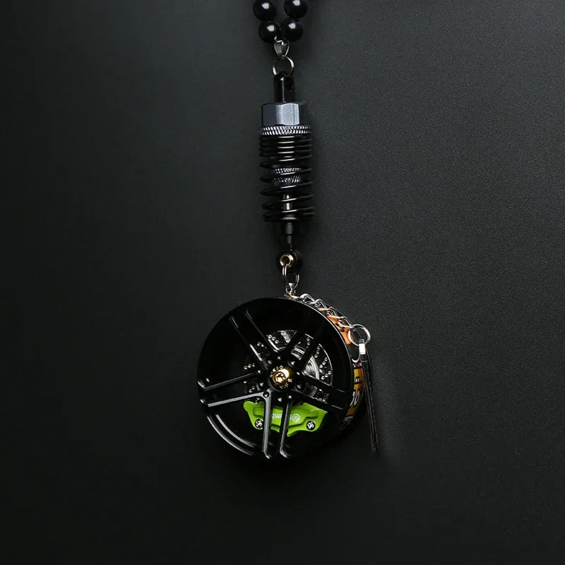 Pendentif décoratif de voiture design amortisseur et moyeu de roue